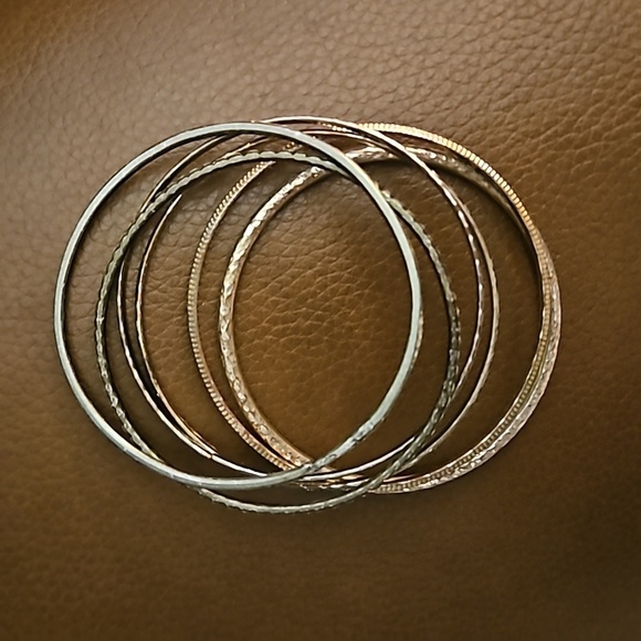 3/$30 Set of Seven Thin Stackable Metal Bangle Bracelets - Picture 5 of 5
